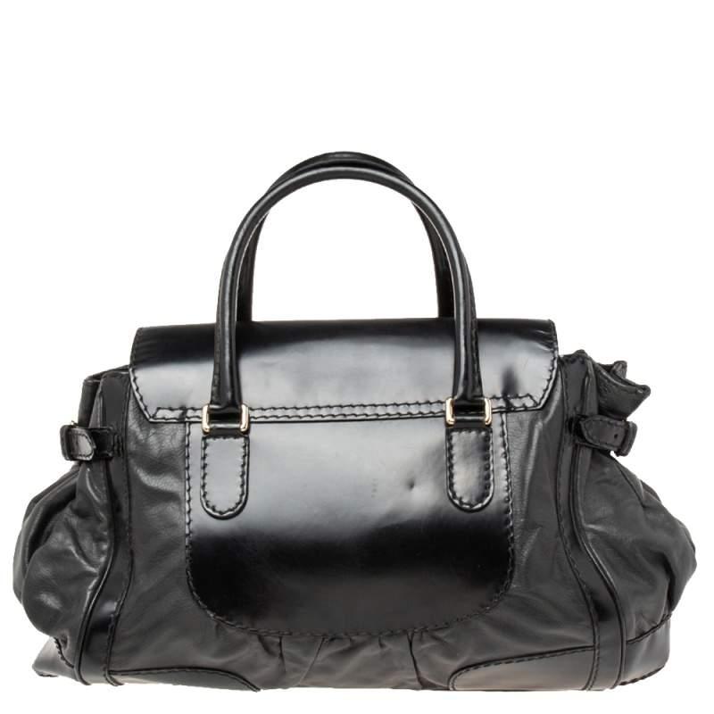 This tote from Gucci has an appealing design, perfect to accompany you to work and after. Crafted from leather, the creation features a buckled bow front, a well-lined interior, and dual handles.

Includes: Original Dustbag

 