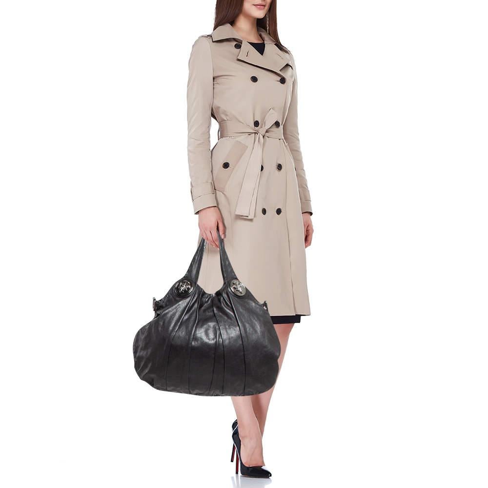 Stylish handbags never fail to make a fashionable impression. Make this designer hobo yours by pairing it with your sophisticated workwear as well as chic casual looks.