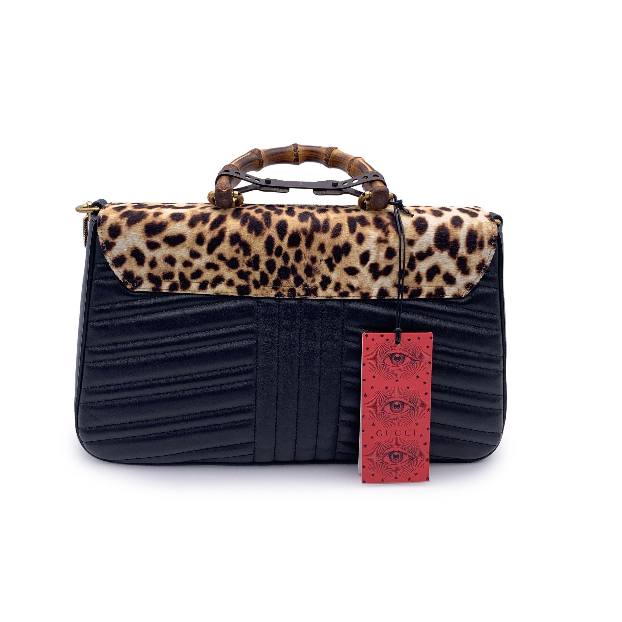 Nero Gucci Borsa a manico alto in pelle nera con stampa leopardo e pelo di bambù