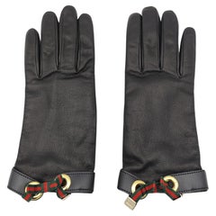 Guanti con fiocco con logo in pelle nera di Gucci