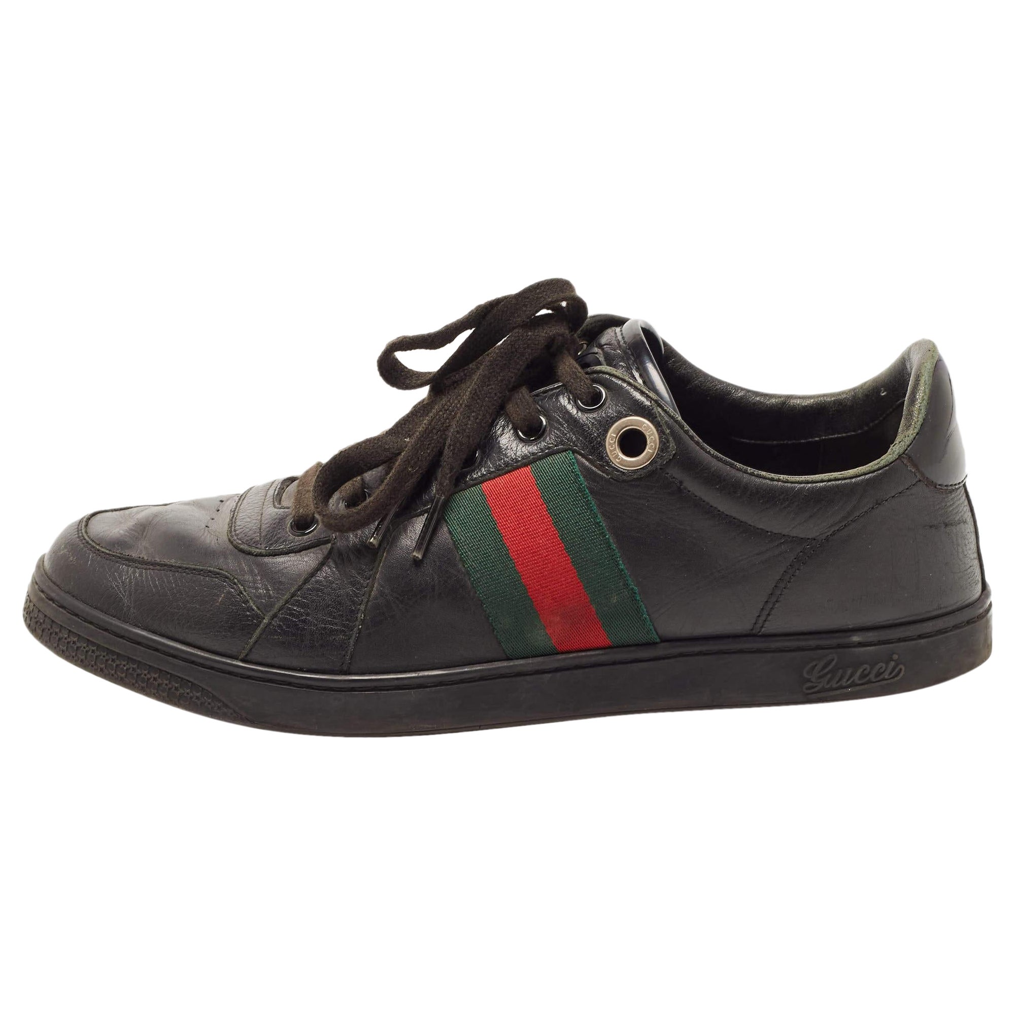 Schwarze Gucci Low Top-Turnschuhe aus Leder Größe 41