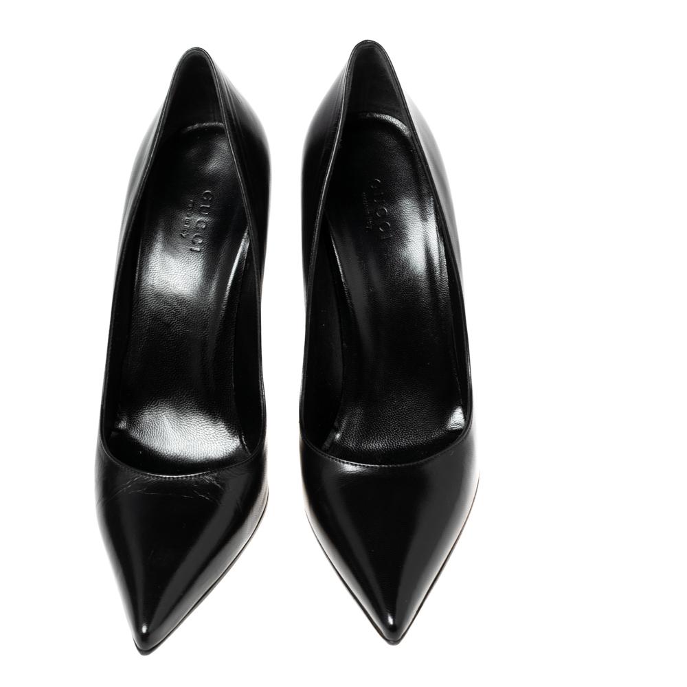 Replace your staple black heels with these fierce and striking Malibu Bamboo pumps by Gucci. Crafted from black leather, they feature extended pointed toes and 10.5 cm heels with chic bamboo details.

Includes: Original Box, Info Booklet, Extra heel