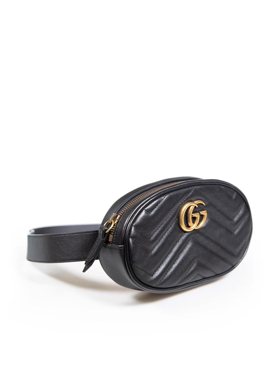 CONDITION is Very good. Minimal wear to bag is evident. Minimal light scratches to the leather strap and base on this used Gucci designer resale item.
 
 
 
 Details
 
 
 Model: GG Marmont
 
 Black
 
 Leather
 
 Mini belt bag
 
 Gold logo detail
 
