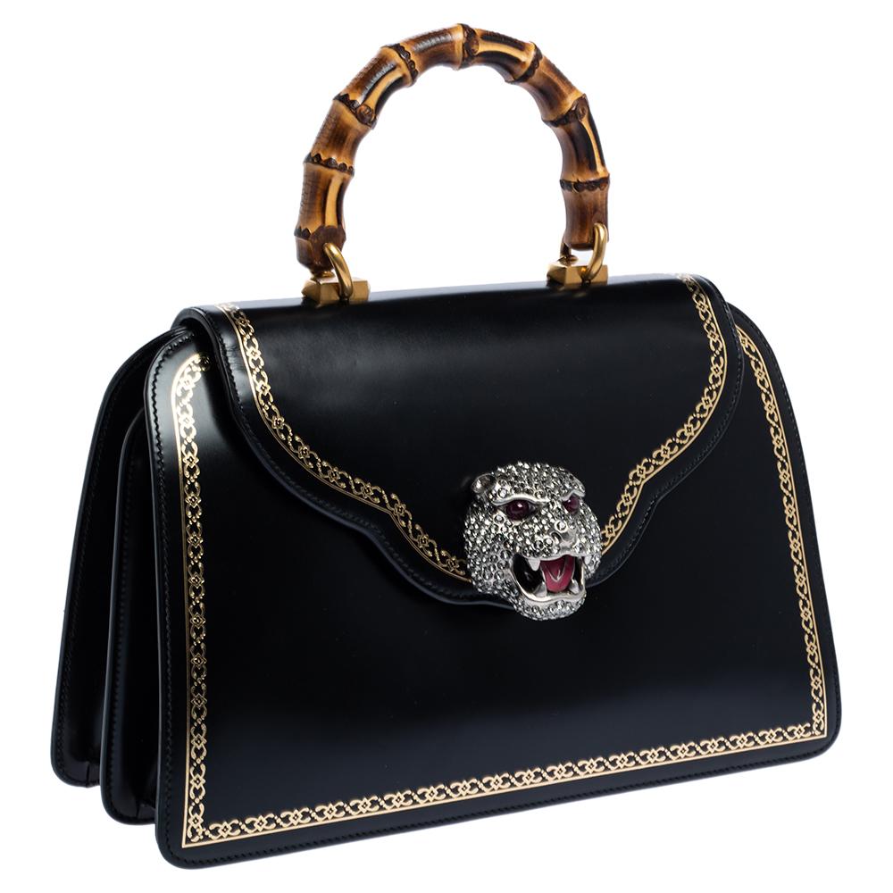 bag with jaguar handle