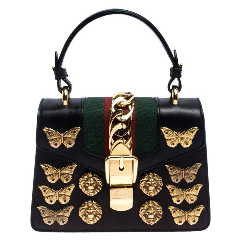 Gucci Black Leather Mini Sylvie Animal Stud Embellished Top For Sale 1stDibs | animal print handbags