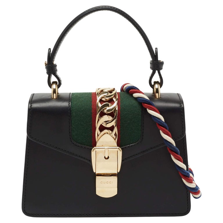Gucci Black Leather Mini Web Chain Sylvie Top Handle Bag For Sale at  1stDibs | gucci sylvie bag black, gucci sylvie chain bag, gucci sylvie top  handle bag