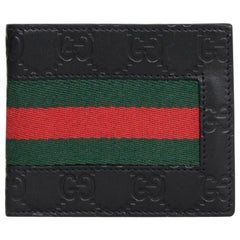Gucci portefeuille signature en cuir noir à monogrammes avec bande web et deux compartiments