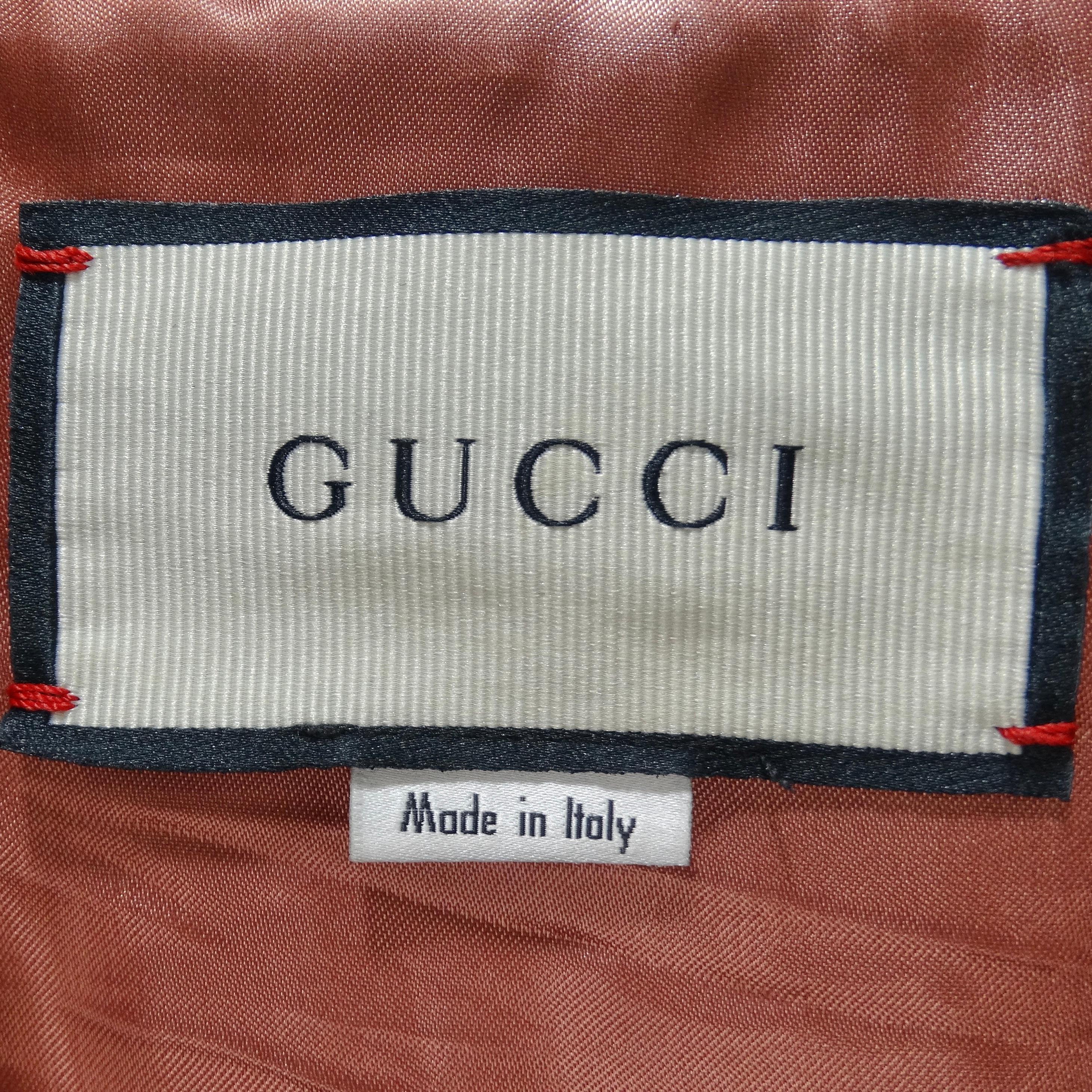 Gucci - Veste en cuir noir avec logo en forme de perle en vente 9