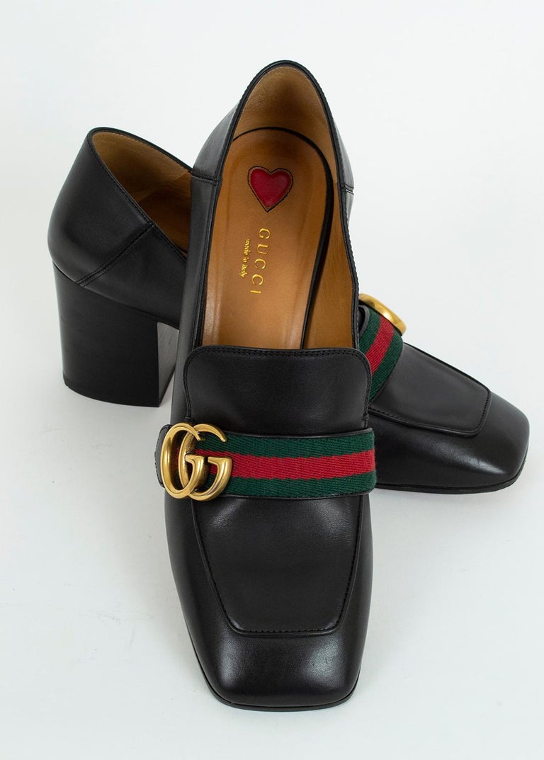 With all the gravitas of a Gucci loafer and the leg-lengthening height of a heel, these walkable gems are instantly-recognizable and transform any street into a runway. Like jewelry for your feet.

Black calfskin leather loafer with green and red