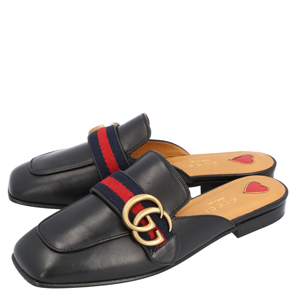 These Gucci Peyton flat mules are easy to style. Constructed in black leather, this stunning pair of shoes feature square toes along with the signature Web detailing and GG logo on the uppers.

Includes: Original packaging