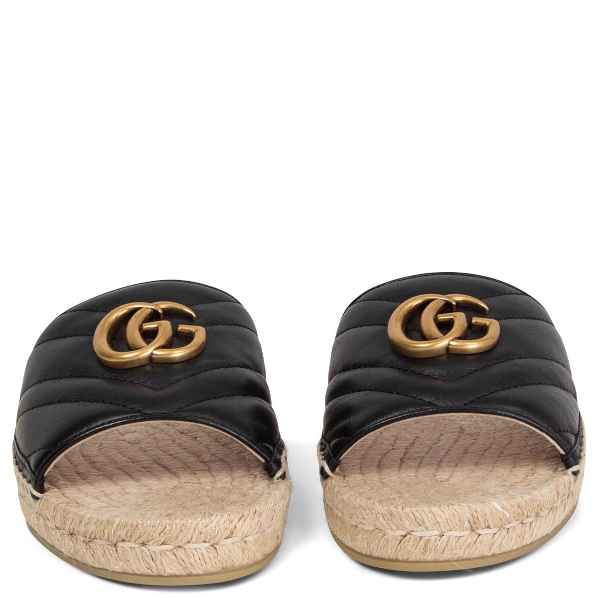 100% authentic Gucci Marmont Pilar GG Quilted Leather Espadrilles Slides in black quilted smooth leather with antique gold-tone GG logo and a beige espadrille sole. Brand new. Come with dust bag. 

Measurements
Imprinted Size	37
Shoe Size	37
Inside