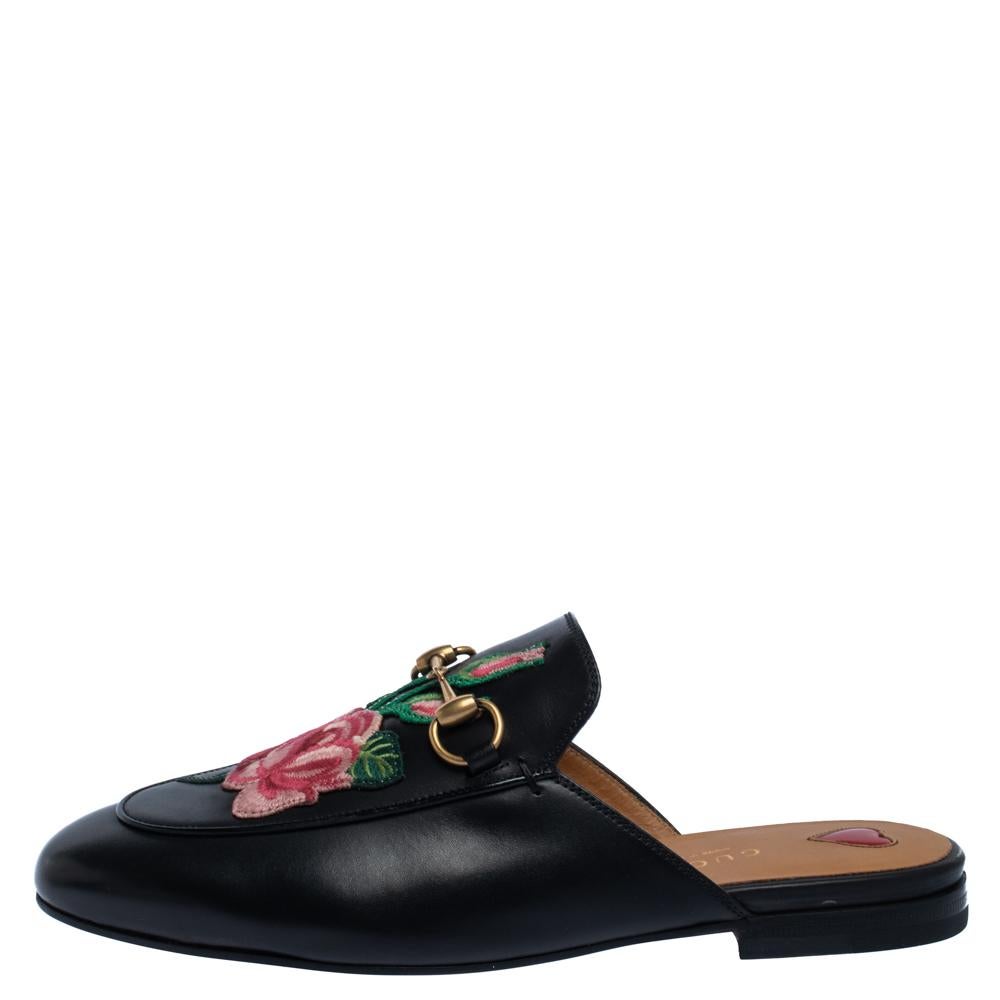These Gucci Princetown mules are a fresh update on the perennially chic Gucci horsebit loafers. These shoes are enhanced by a gold-tone horsebit detail that has defined the Gucci collection since the very beginning. Featuring a flower-embroidered