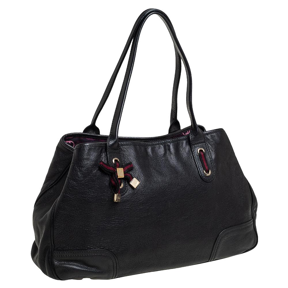 This bag by Gucci is a practical option perfect for carrying your daily needs. Carry this cool black Princy tote to finish your laid-back everyday look. It has dual handles, web detailing, fabric-lined interior and gold-tone hardware.

