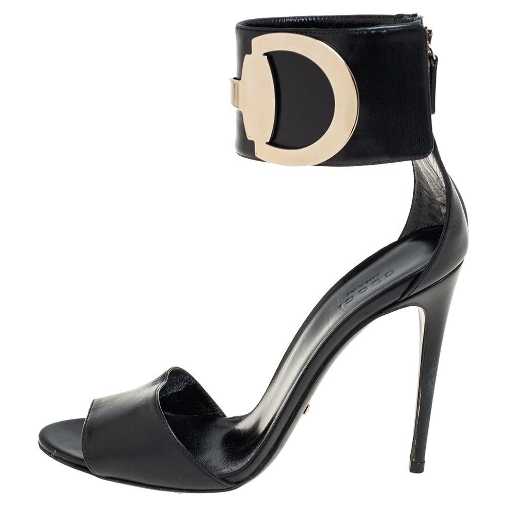 The right pair of shoes does not only make a woman look fabulous, but also gives her confidence. These Gucci sandals carry immense elegance and wonder, flaunting a minimalist design with open toes, gold-tone Icon bit detailed ankle cuffs, back
