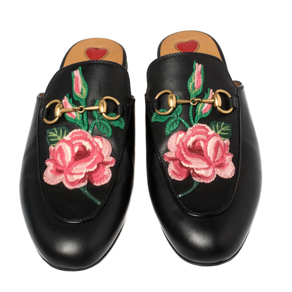 First introduced as part of Gucci's Fall Winter 2015 collection, the Princetown mules are an absolute favorite worldwide and have been worn by countless celebrities. These mules have been designed in black leather and detailed with embroidered rose