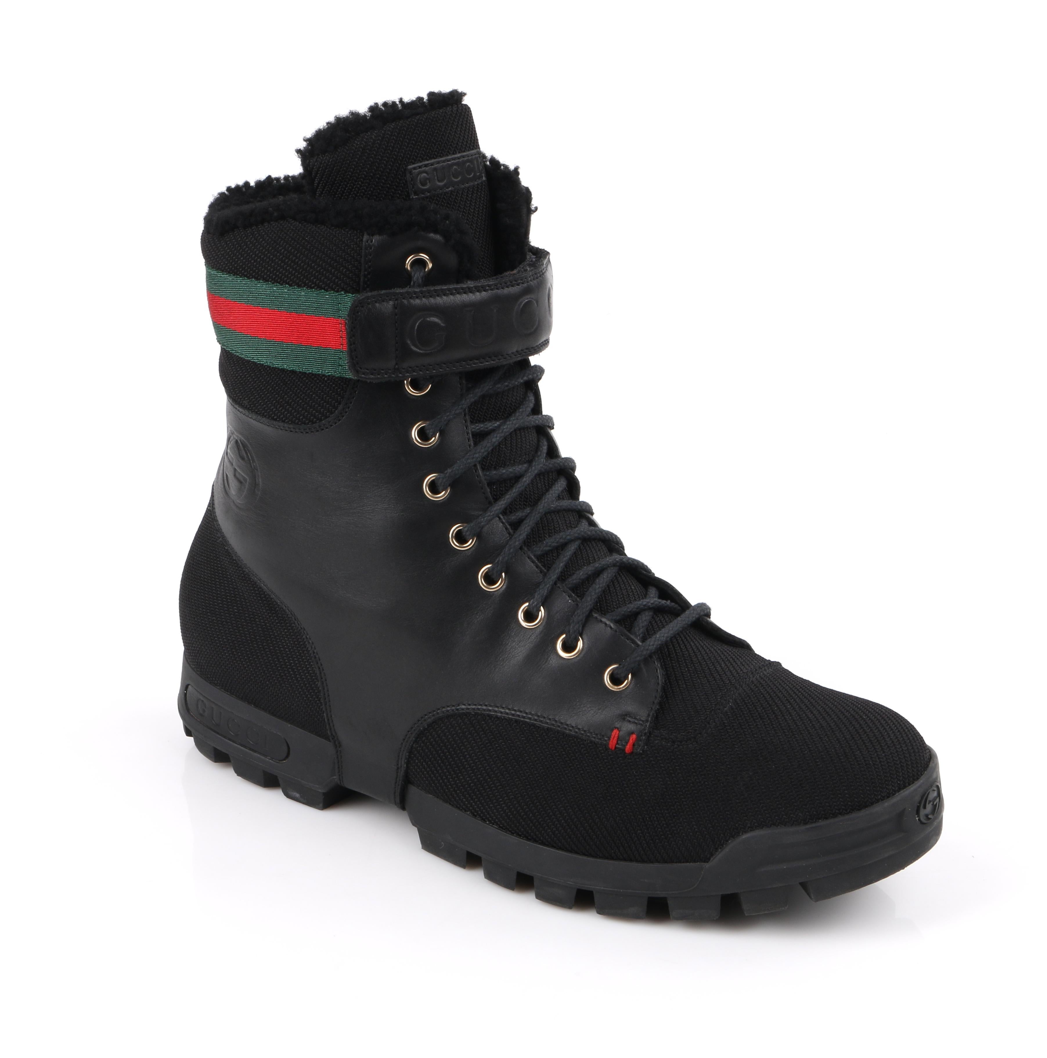 DESCRIPTION: GUCCI Black Leather Signature Webbing Shearling Lined Combat Boots
 
Brand / Manufacturer: Gucci
Collection: 
Designer:
Manufacturer Style Name: 
Style: Combat boots
Color(s): Black, green, and red
Marked Materials: Upper: Leather and