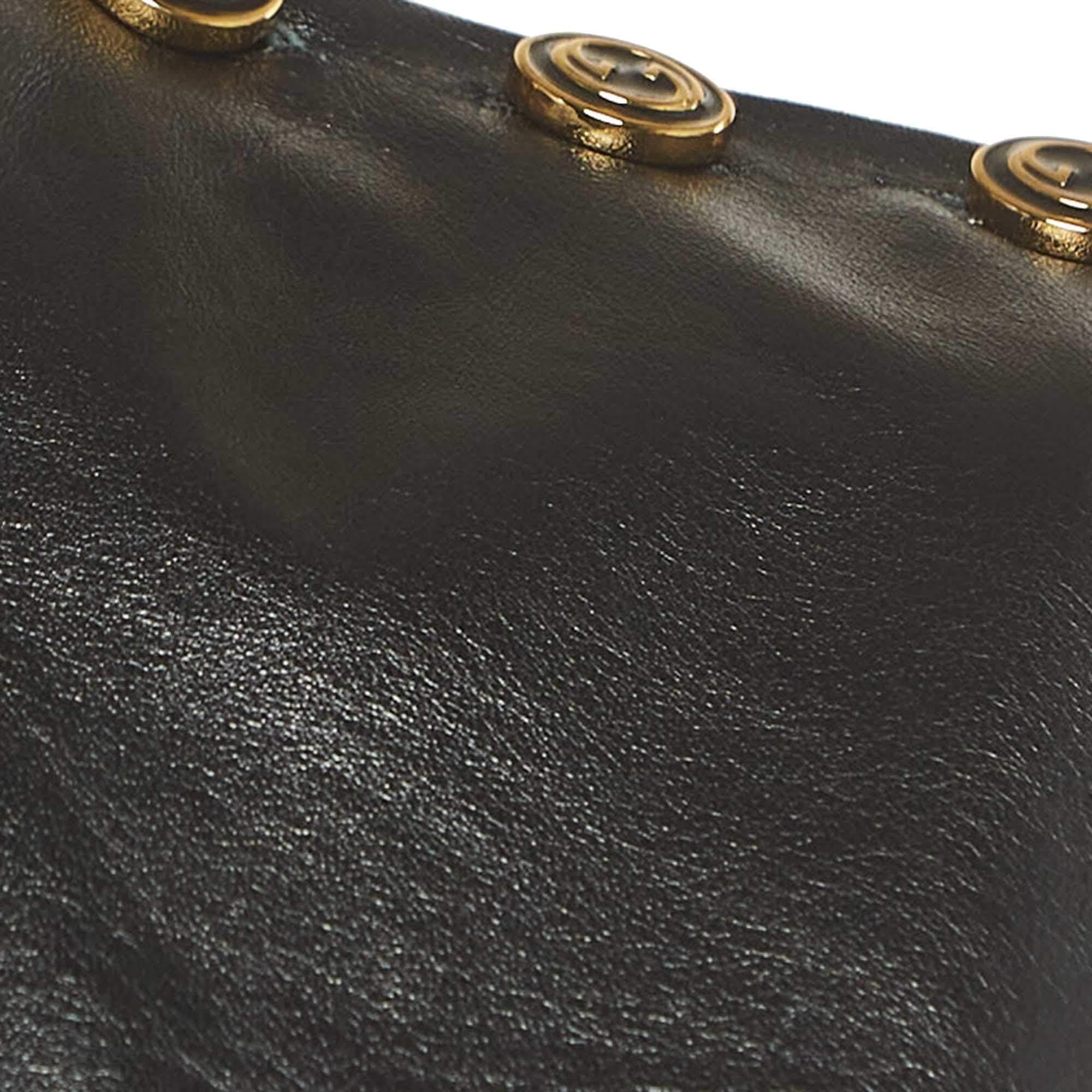 Schwarzes ärmelloses Gucci-Minikleid aus Leder S im Angebot 4