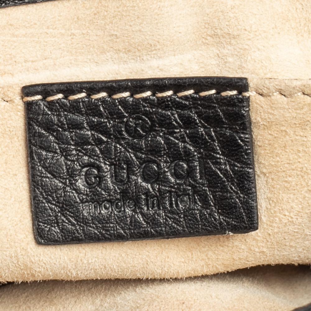 Gucci Kleine 1973 Crossbody-Tasche aus schwarzem Leder mit Kette Damen