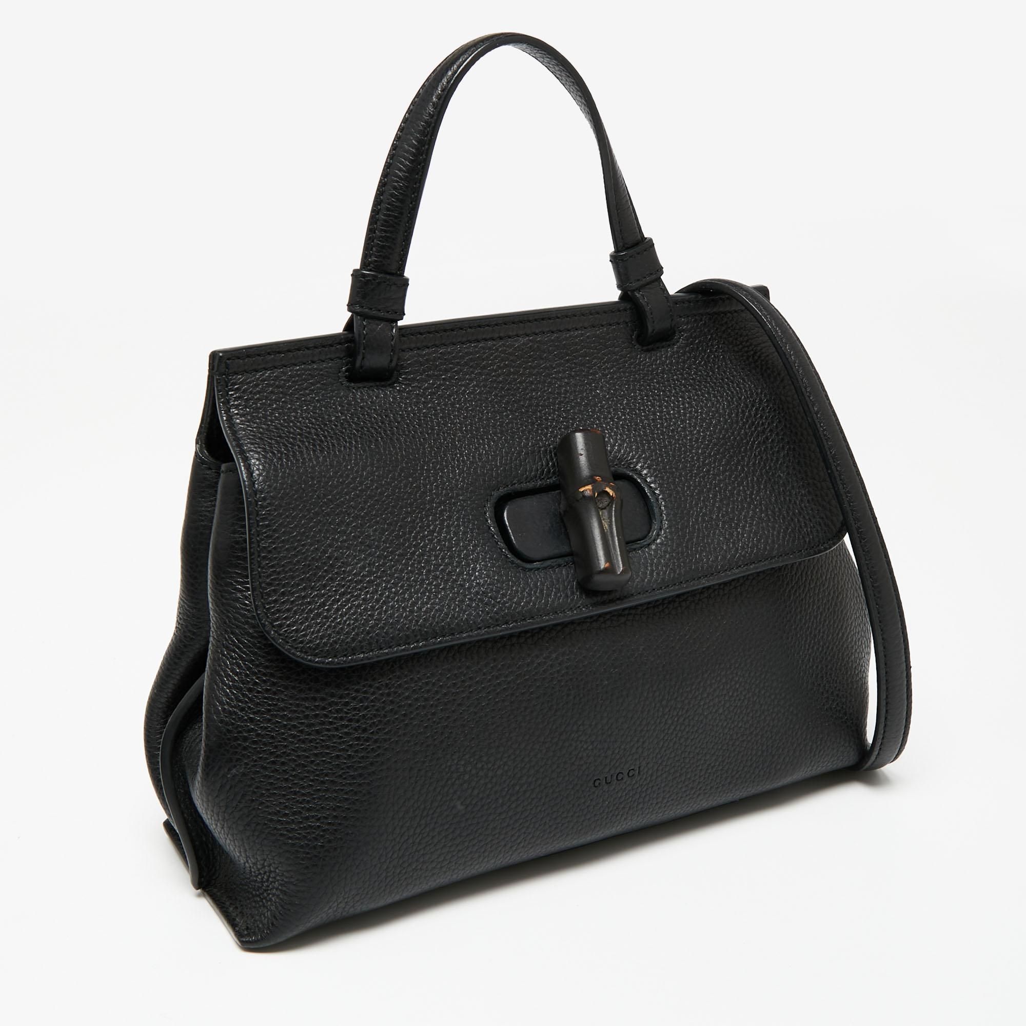 
Like all other designs of Gucci, this bag also signifies the brand's mastery in creating timeless accessories. The bamboo turn-lock closure on the front serves as its fascinating element and the bag owns a contemporary shape. Made from leather, its