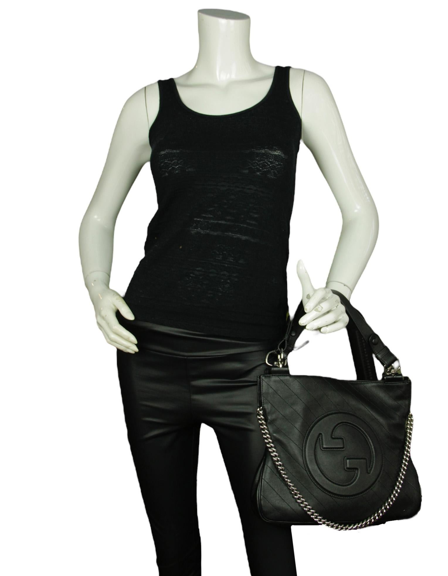 Gucci Black Small Blondie Shoulder Bag

Made In: Italy
Color: Black
Hardware: Silvertone
Materials: Leather
Lining: Fine textile
Closure/Opening: Magnetic
Exterior Pockets: None
Interior Pockets: One zipper 
Exterior Condition: Excellent
Interior