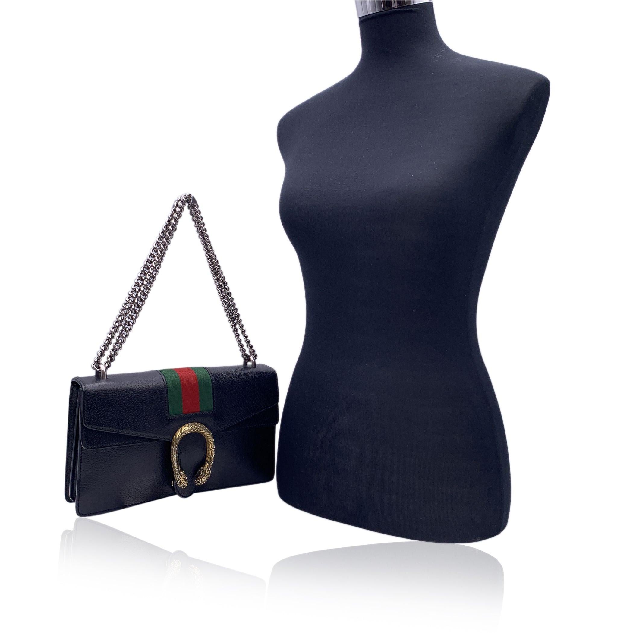 This beautiful Bag will come with a Certificate of Authenticity provided by Entrupy. The certificate will be provided at no further cost GUCCI small GG Supreme Dionysus shoulder bag. Crafted in black leather. Flap closure with gold metal tiger heads