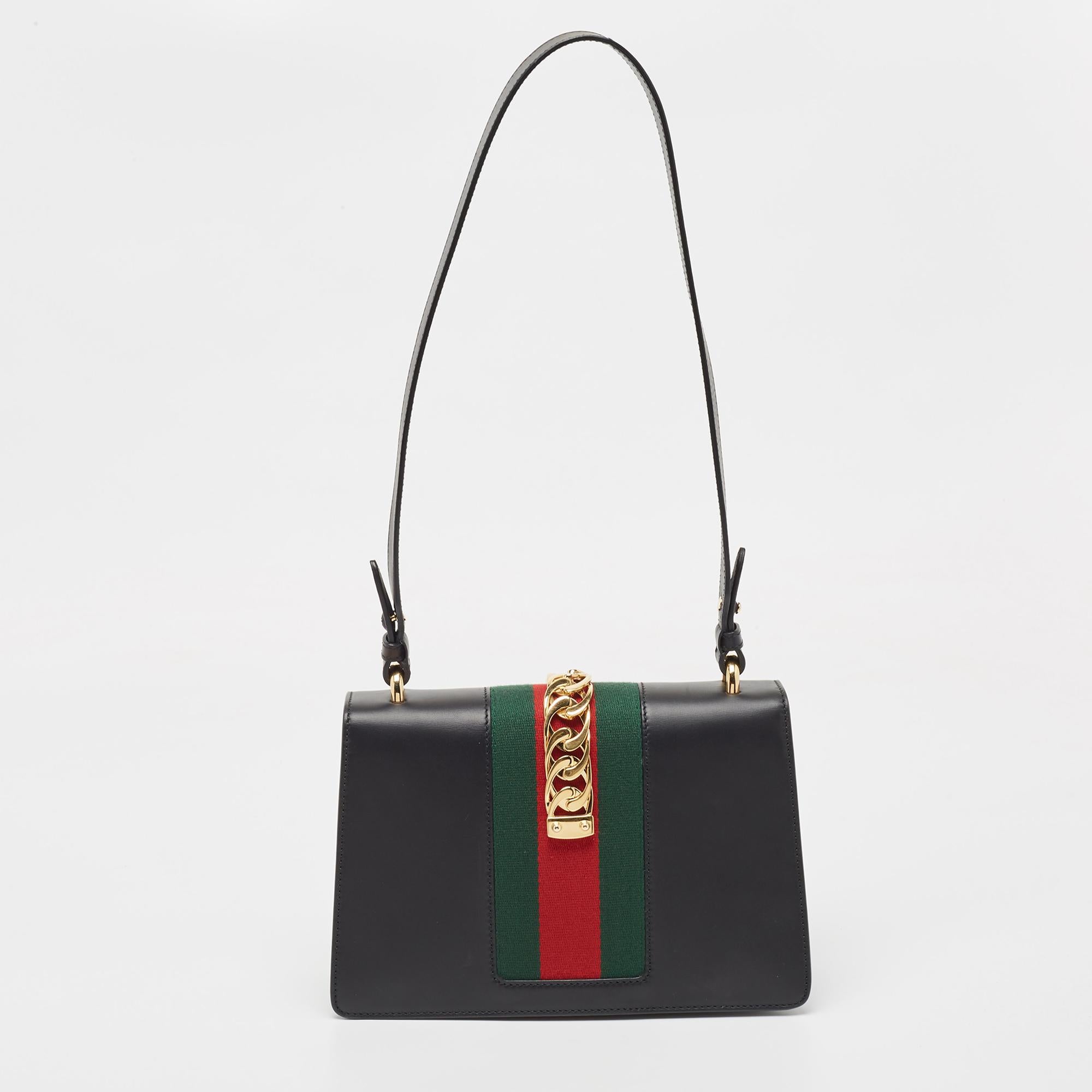 All the designs from Gucci, like this Sylvie bag, reflect a sense of innovation and tradition. Crafted from leather with a brand signature all over, it is admired for its alluring finish.

Includes: Original Dustbag, Info Booklet, Detachable Strap