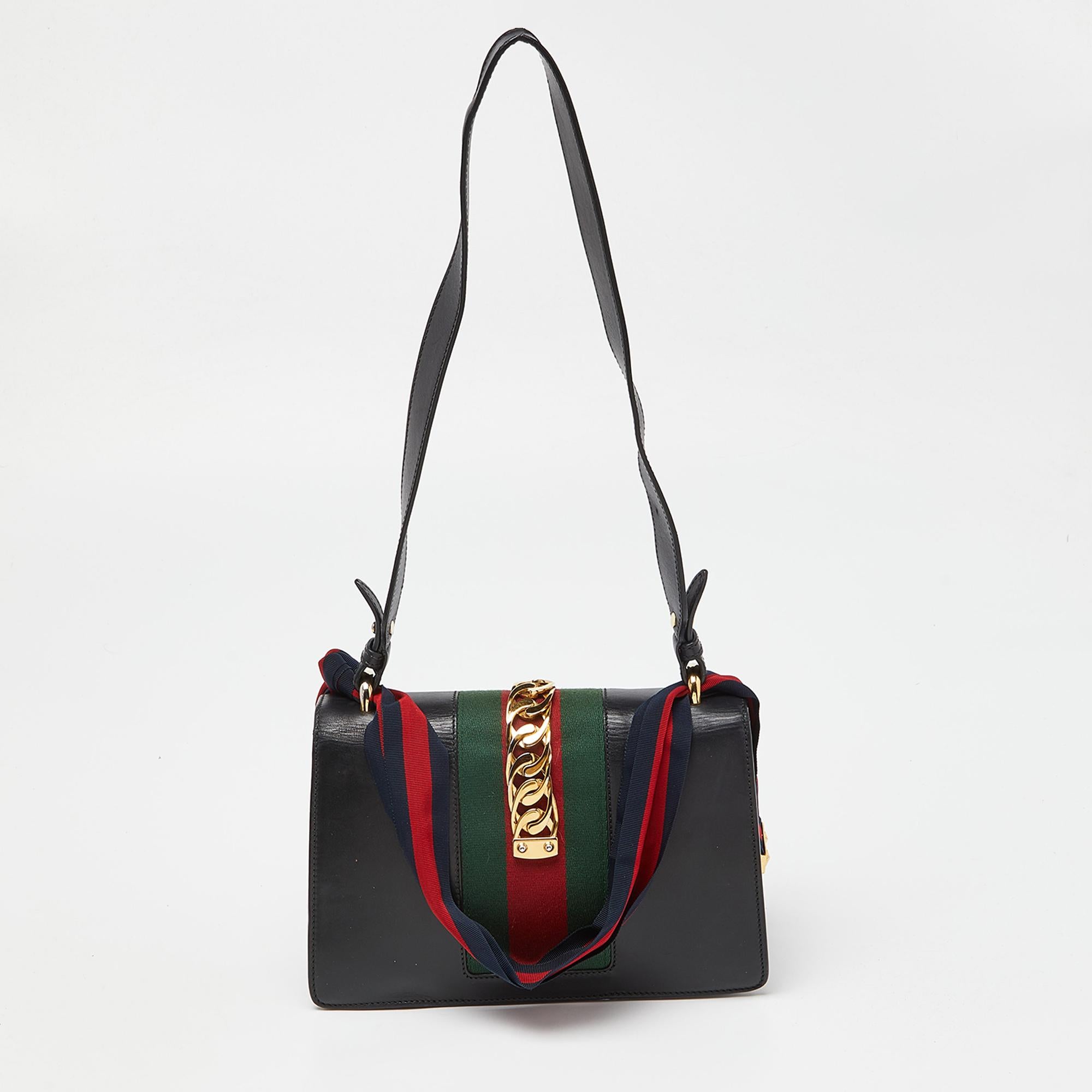 Indulge in luxury with this Gucci bag. Meticulously crafted from premium materials, it combines exquisite design, impeccable craftsmanship, and timeless elegance. Elevate your style with this fashion accessory.

Includes: Original Dustbag, Info
