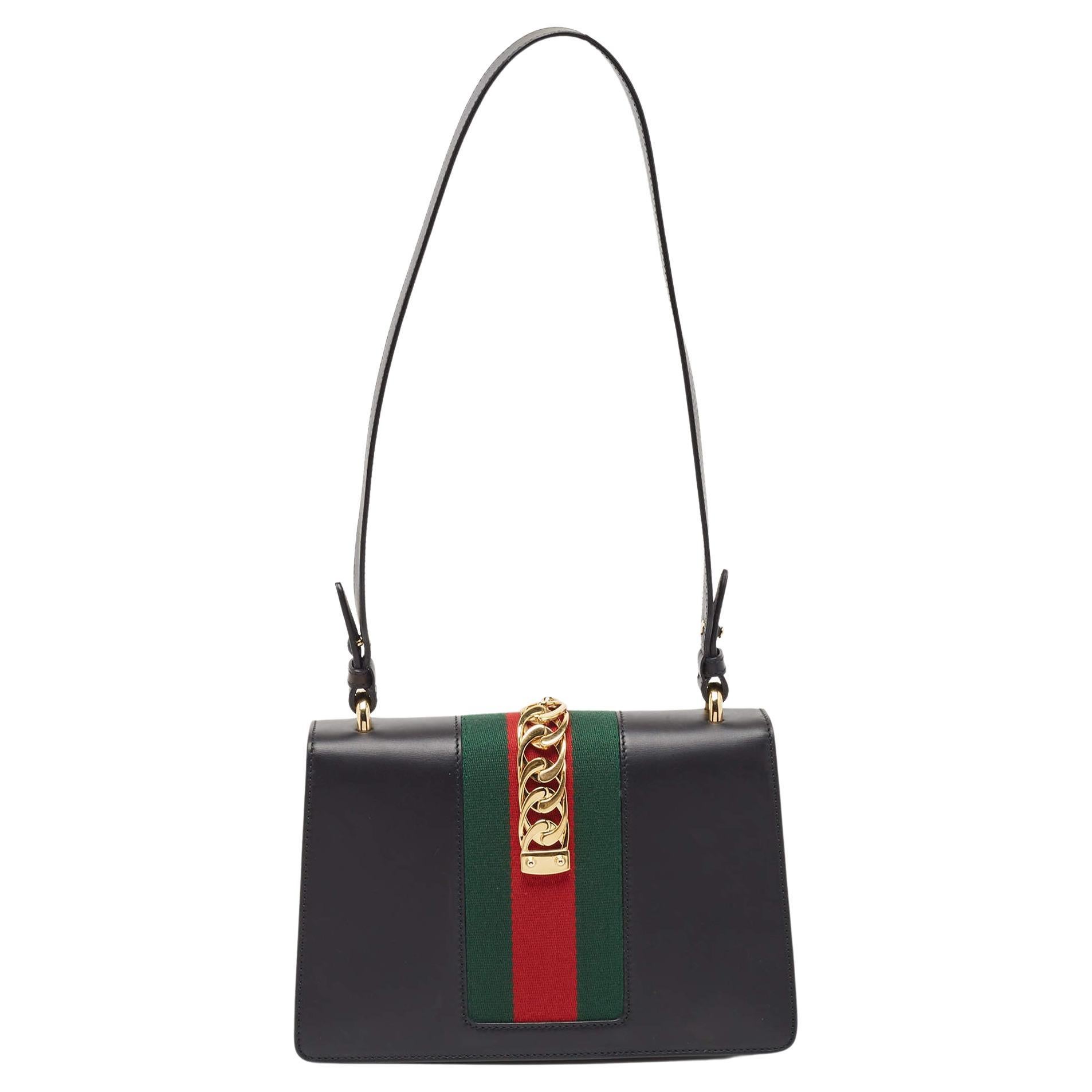 All the designs from Gucci, like this Sylvie bag, reflect a sense of innovation and tradition. Crafted from leather with a brand signature all over, it is admired for its alluring finish.

Includes: Original Dustbag, Info Booklet, Detachable Strap

