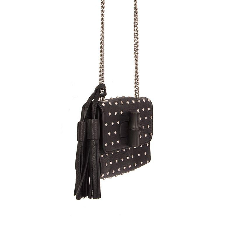 Gucci 'Studded Miss Bamboo Small' shoulder bag in black leather with tassel. Bamboo turn-lock closure. Lined in dark taupe leather with an open pocket against the back. Has been carried and is in virtually new condition.

Height 12cm (4.7in)
Width