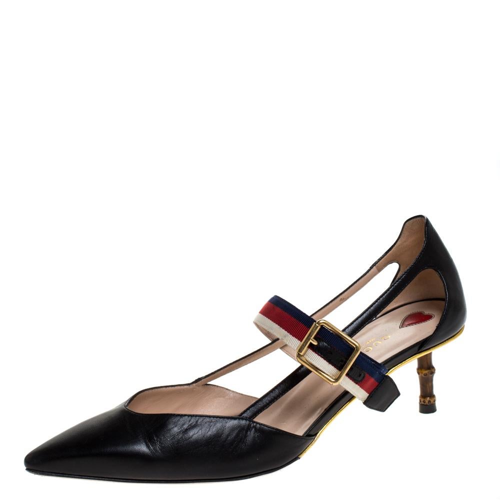 These pointed-toe pumps from Gucci have come straight from a shoe lover's dream. Crafted from black leather, detailed with signature Web straps and balanced on short bamboo heels, the pumps are lovely and gorgeous!

