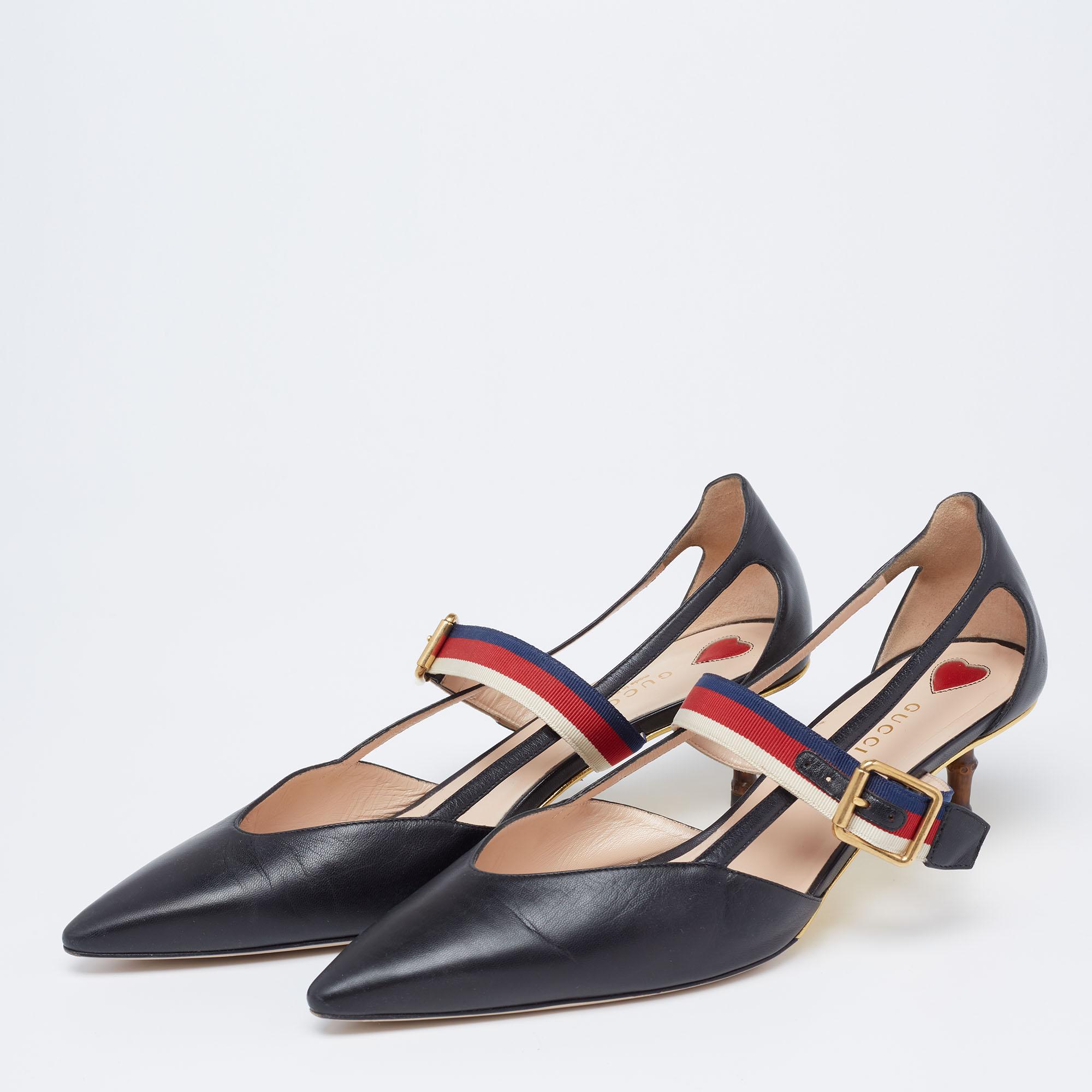 These pointed-toe pumps from Gucci have come straight from a shoe lover's dream. Crafted from black leather, detailed with signature Web straps, and balanced on low bamboo heels, the pumps are fashionable and gorgeous!

Includes: Original Box, Info