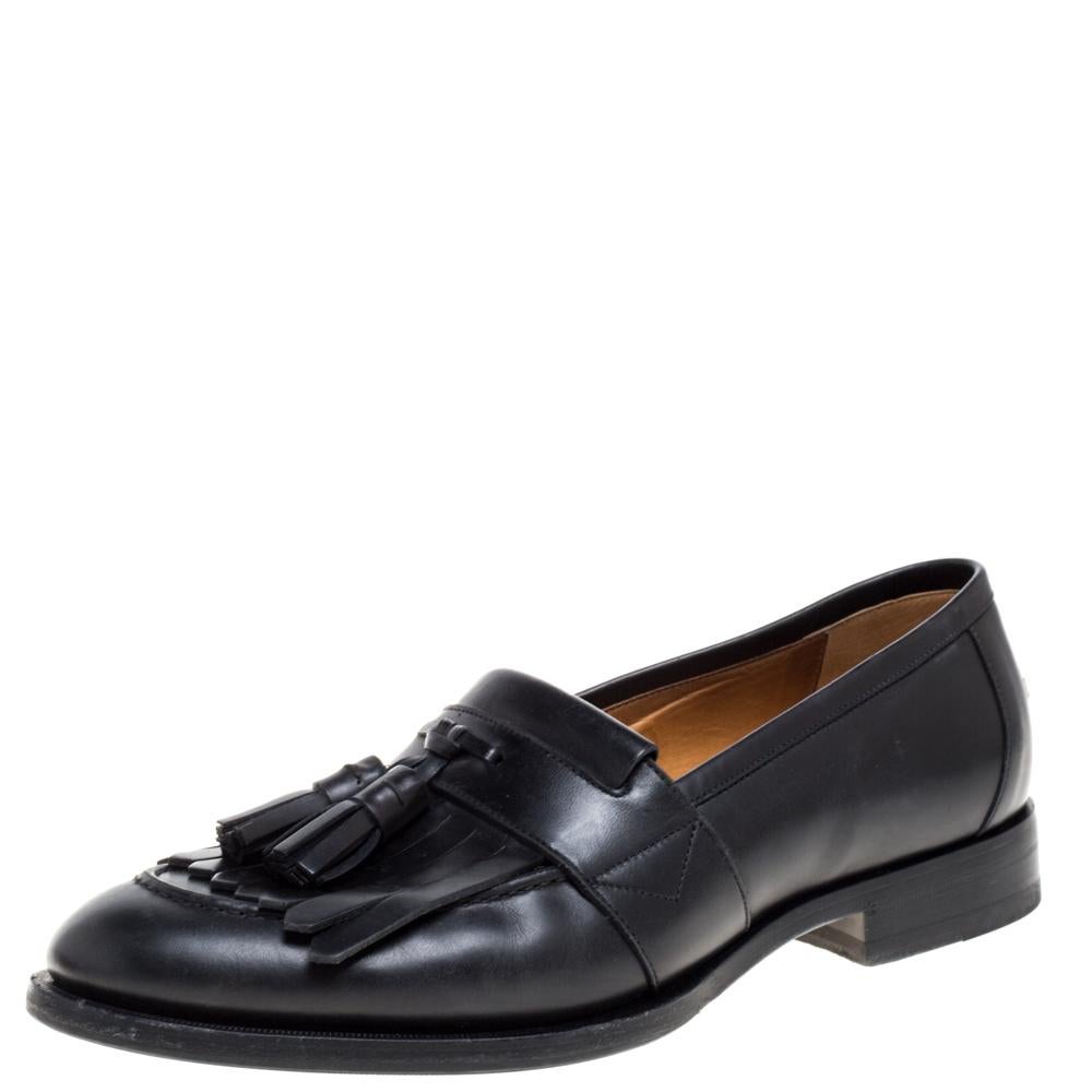 Purposely created to exude style and provide comfort wherever you go, this pair of loafers by Gucci is absolutely worth the buy! They've been crafted from black leather, styled with tassels on the vamps and the signature embroidered bees on the