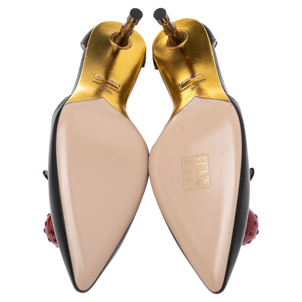 These pointed-toe pumps from Gucci have come straight from a shoe lover's dream. Crafted from black leather, detailed with cherry motifs, and balanced on 4 cm bamboo heels, the pumps are lovely and gorgeous!

Includes: Original Dustbag, Original