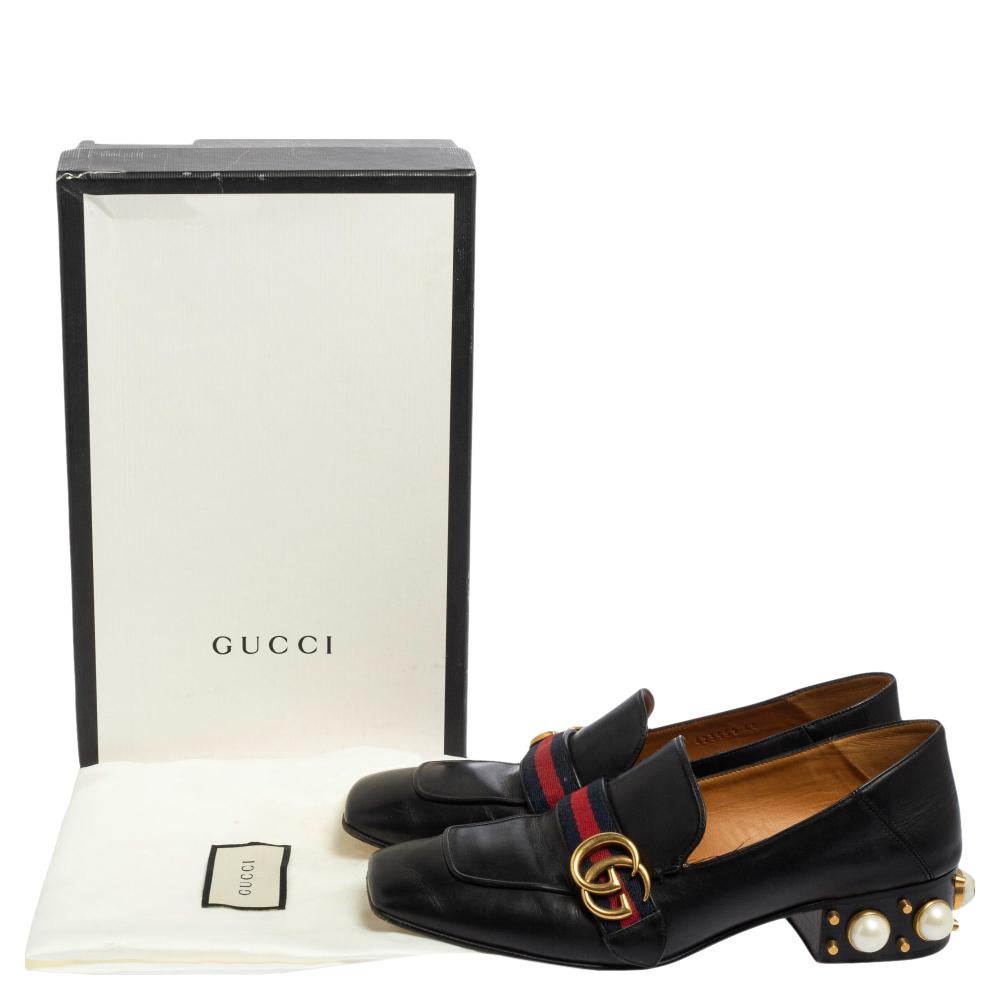 Brimming with signature details, these Gucci loafer pumps made of leather will certainly bring you a stunning look. While the vamps are adorned with a gold-tone GG motif and the Web trim, the heels are decorated with GG faux pearls and studs. Revamp