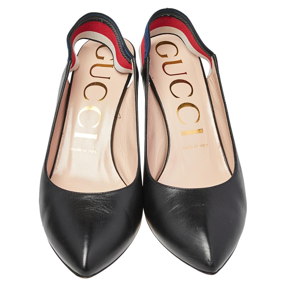 Amp up any outfit with these Gucci Sylvie pumps. Crafted from leather in Italy, they feature the signature web strap as elastic slingbacks with pointed toes and sleek stiletto heels. The grand black shade adds to this pair in a fashionable