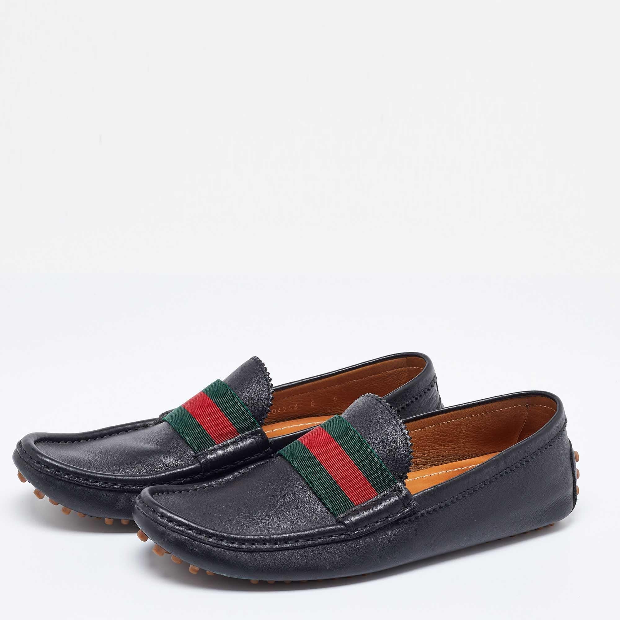A classic design that will never be out of fashion this pair of green loafers from Gucci is a worthy purchase. Sewn by skilled hands the leather shoes feature neat stitching signature Web trims comfortable insoles and durable outsoles.