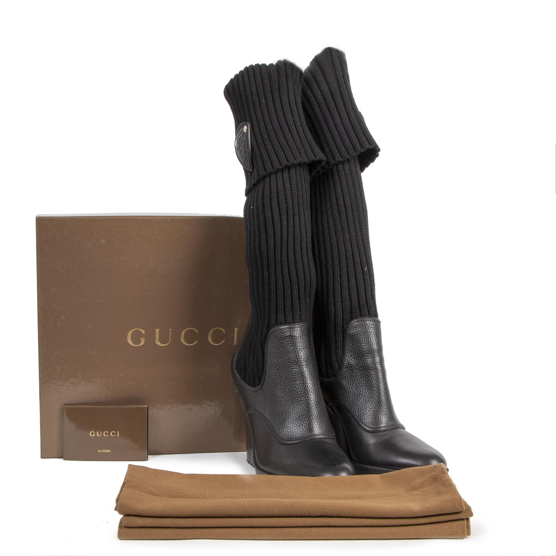 Excellent preloved condition

Gucci Black Wedge Sock Boots - size 41

These gorgeous Gucci wedge knit sock boots are definitely worth checking out. These wedge boots are crafted out of black leather and black fabric, perfect to keep it warm and cosy