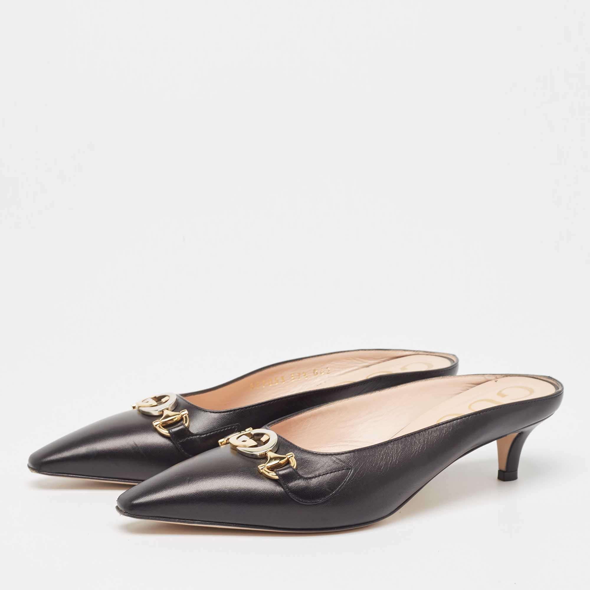 Lift your look without compromising on comfort when you slip into these mules. Made from leather the black kitten heel mules are perfect for any occasion.
