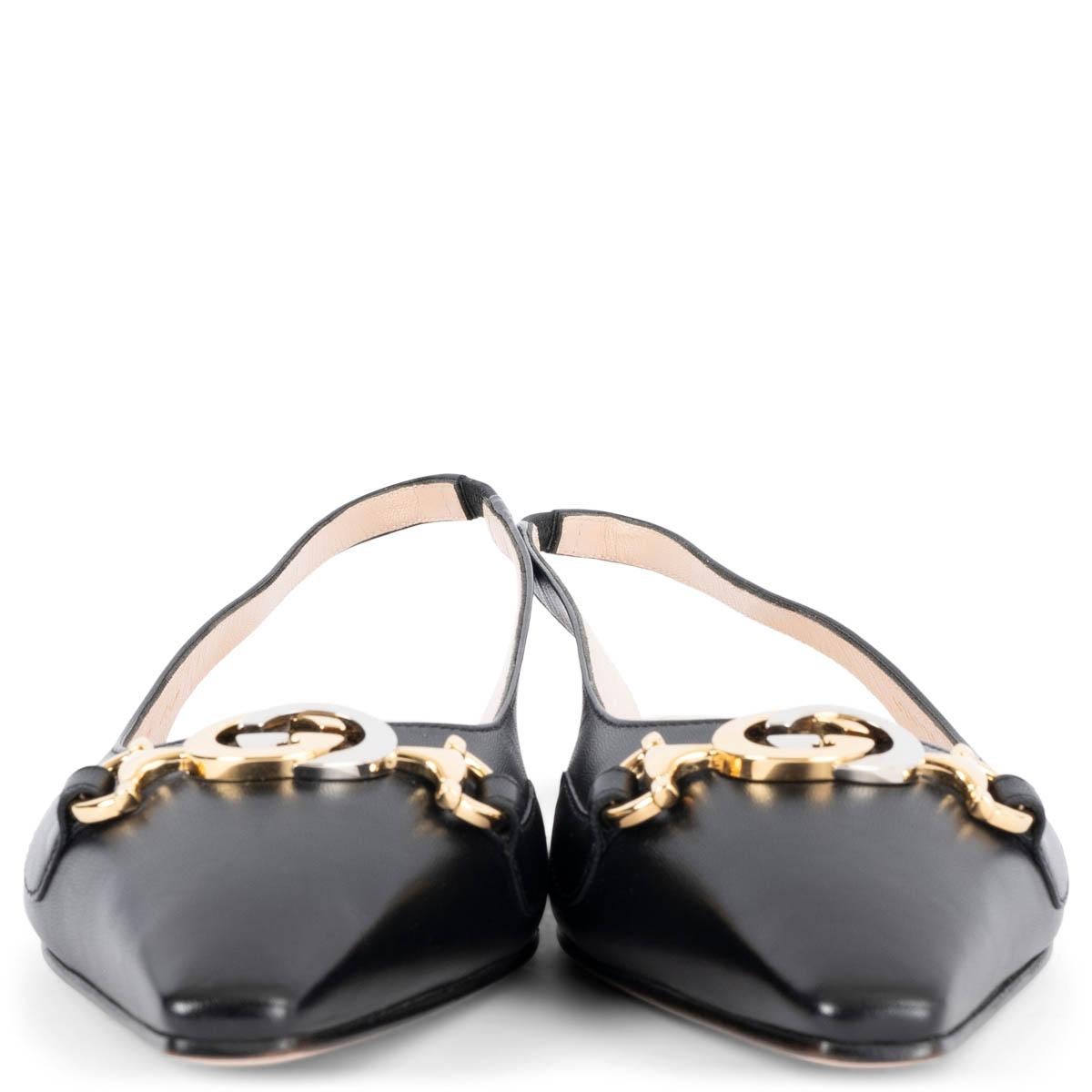 100% authentic Gucci Zumi pointed-toe slingbacks in black smooth calfskin decorated with the iconic Interlocking G horsebit detail in gold- and silver-tone metal. Brand new. Come with dust bags. 

Measurements
Imprinted Size	39
Shoe Size	39
Inside
