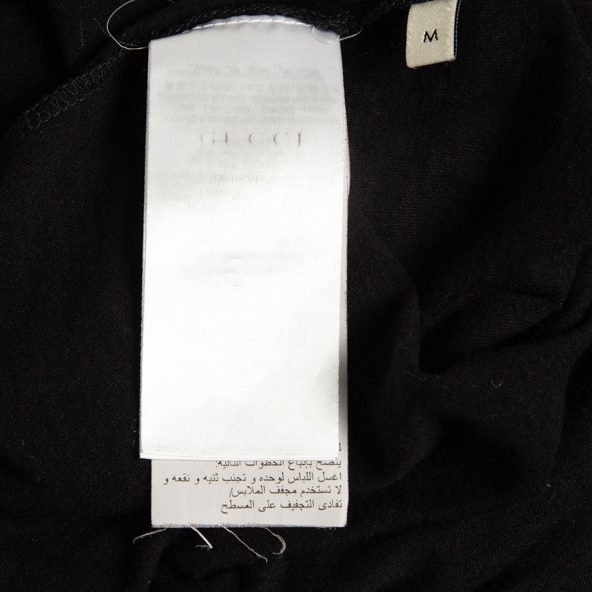 Donna Gucci Maglietta in cotone invecchiato con stampa del logo nero M. T. I. in vendita