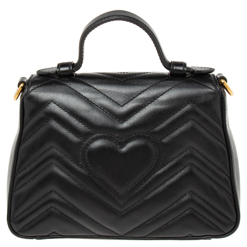 This Marmont top handle bag has been exquisitely crafted from Matelassé leather and equipped with a well-sized Alcantara interior. There is a shiny GG logo on the front flap and the detachable shoulder strap allows a hand-free option.

Includes: