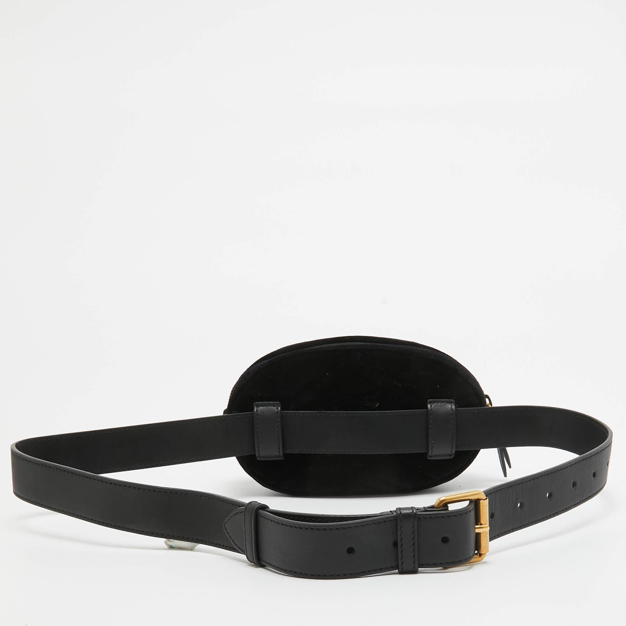 The Gucci belt bag exudes timeless elegance. Crafted from supple black velvet, its quilted matelassé pattern is adorned with the iconic GG logo. The shoulder bag seamlessly combines luxury and sophistication, making it a must-have accessory for the