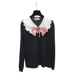 Pull à nœuds en laine mérinos noire de Gucci - Sz.M.