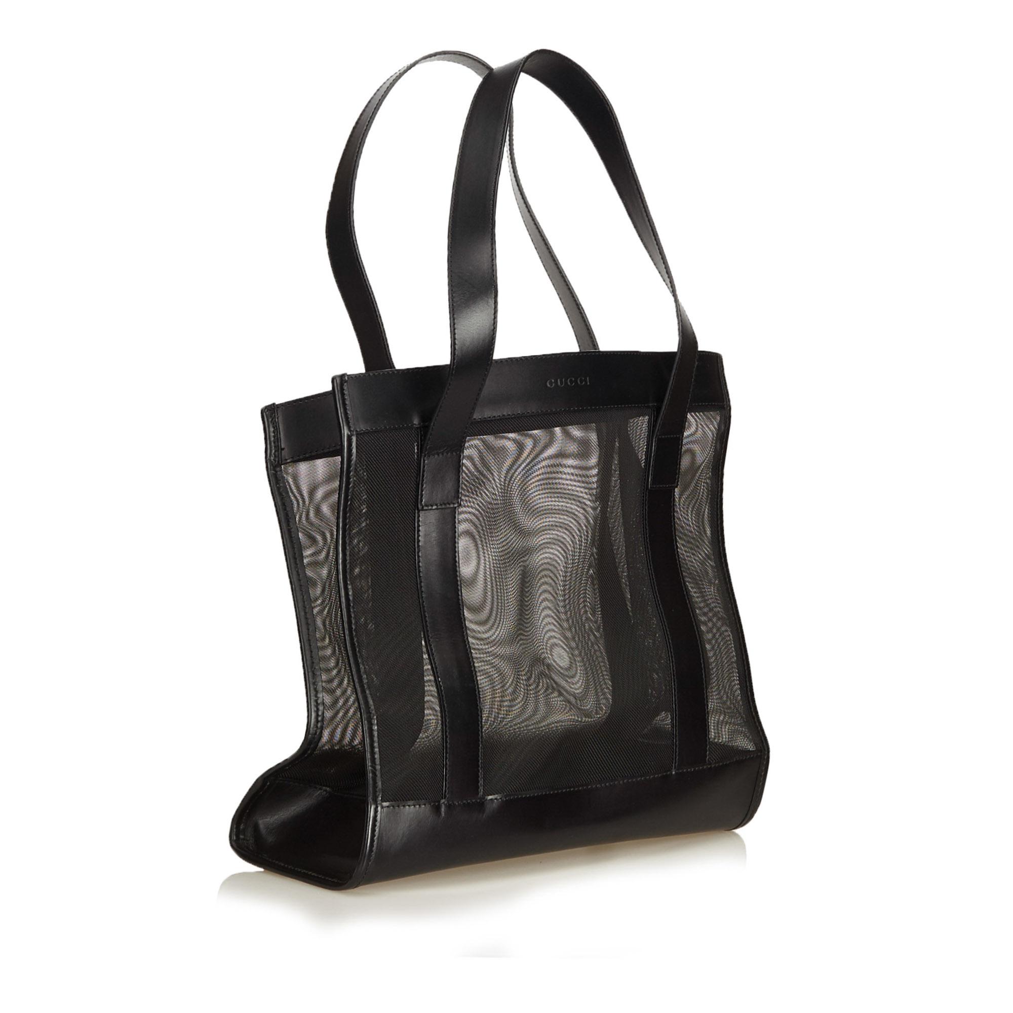 This tote bag features a mesh body, flat leather straps, and an open top. It carries as AB condition rating.

Inclusions: 
This item does not come with inclusions.

Dimensions:
Length: 27.00 cm
Width: 26.00 cm
Depth: 12.00 cm
Shoulder Drop: 19.00
