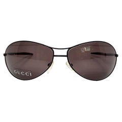 Lunettes de soleil aviateur Gucci à monture métallique noire et verres teintés marron circa 1990
