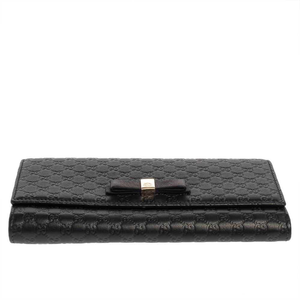 Gucci Black Microguccissima Leather Bow Flap Continental Wallet In Good Condition In Dubai, Al Qouz 2