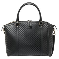Gucci Schwarze Microguccissima große Kuppel-Tasche aus Leder