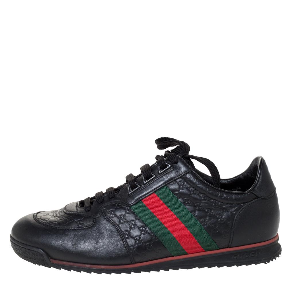 Step into these Gucci sneakers for instant comfort! They feature the iconic Gucci Web detail on the Microguccissima leather exterior. They are lined with leather and finished with lace-ups and rubber soles. Pair these with practical casuals for a