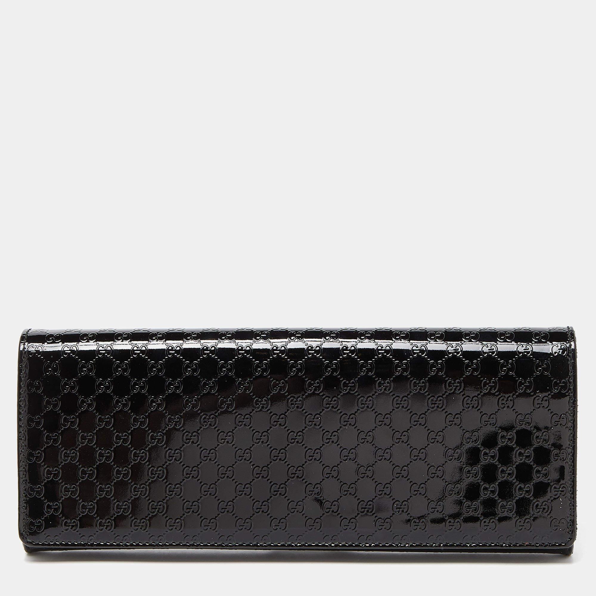Crafted from quality materials, your wardrobe is missing out on this beautifully made designer clutch. Look your fashionable best in any outfit with this stylish clutch that promises to elevate your ensemble.

Includes: Original Dustbag

