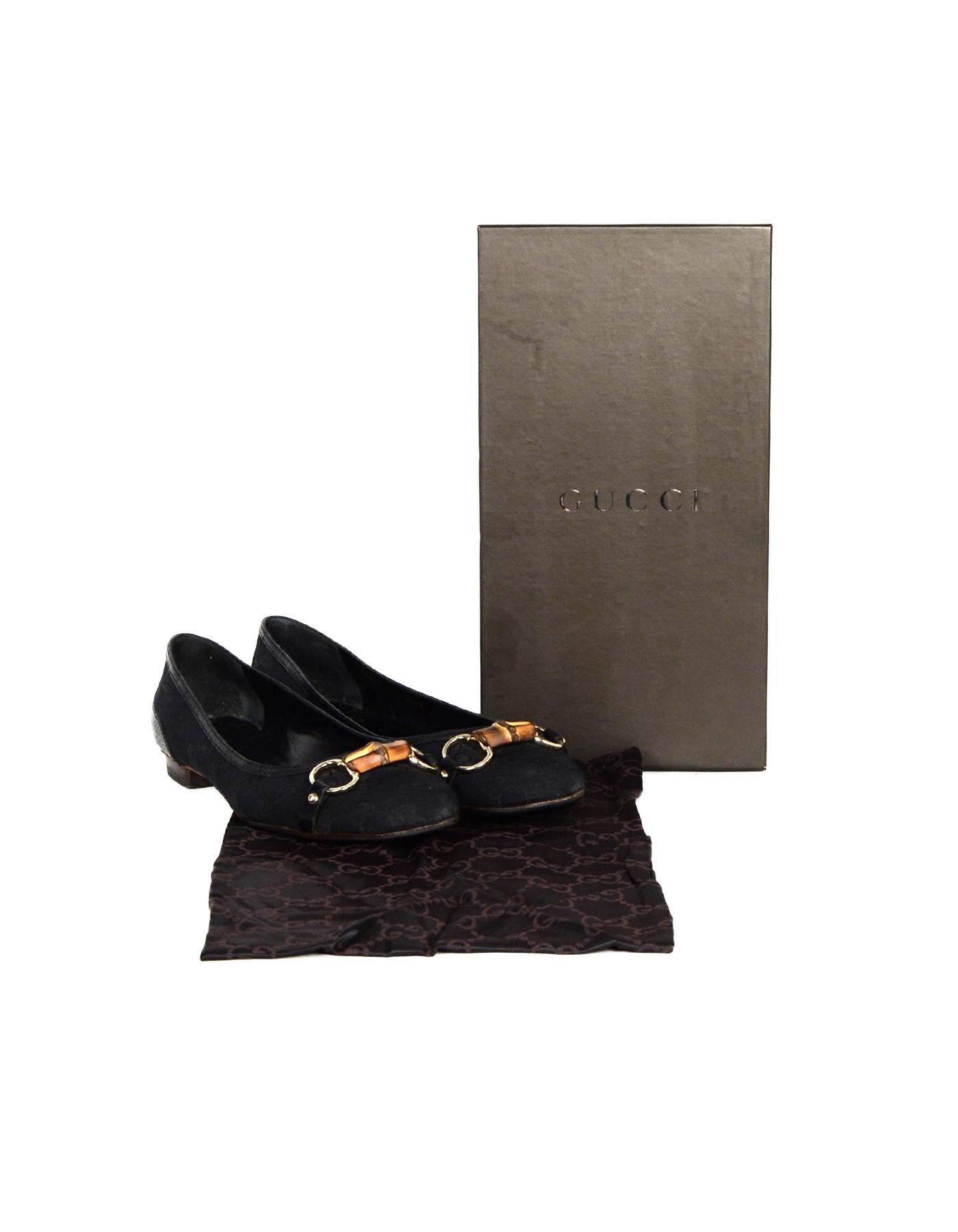 Gucci Black Monogram Ballet Flats w/ Bamboo Horsebit sz 9.5

Made In: Italy
Color: Black
Hardware: Antique goldtone and bamboo hardware
Materials: Canvas
Closure/Opening: Slide on
Overall Condition: Very good pre-owned condition, with light wear to